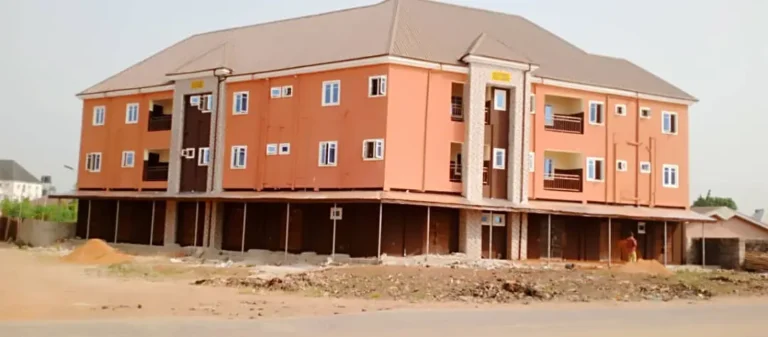 Front view of Completed residence and shop line building constructed by Janepath Engineering